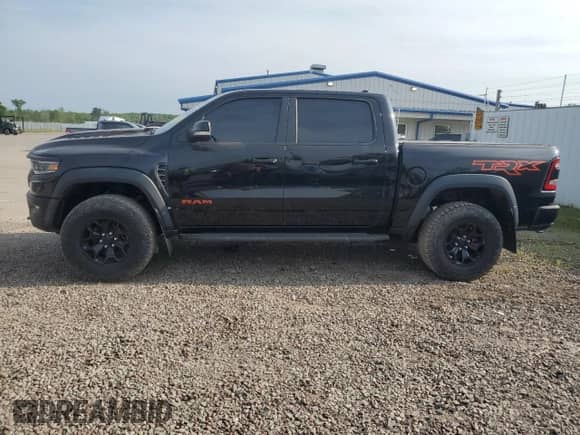 2021 Ram 1500 TRX с VIN 1C6SRFU99MN758770, выставлен на аукционе Copart как лот 64542315 с пробегом 59 155 миль миль и Списание • Salvage title. История ставок и продаж доступна на DreamBid. Изображение 12.