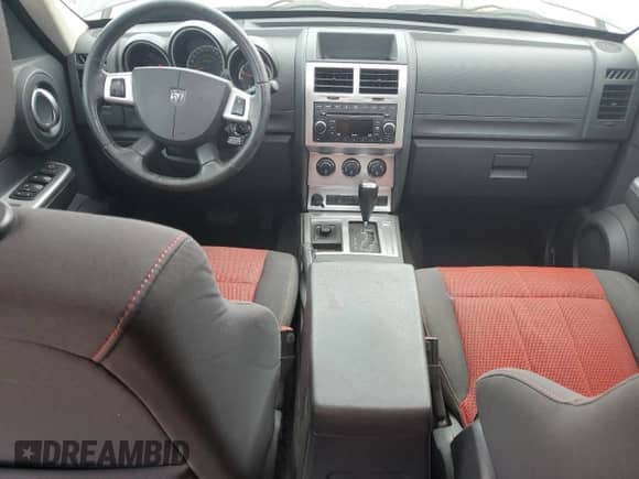 2007 Dodge Nitro R/T с VIN 1D8GU58617W622205, выставлен на аукционе Copart как лот 57022844 с пробегом 132 452 миль миль и Списание • Salvage title. История ставок и продаж доступна на DreamBid. Изображение 8.