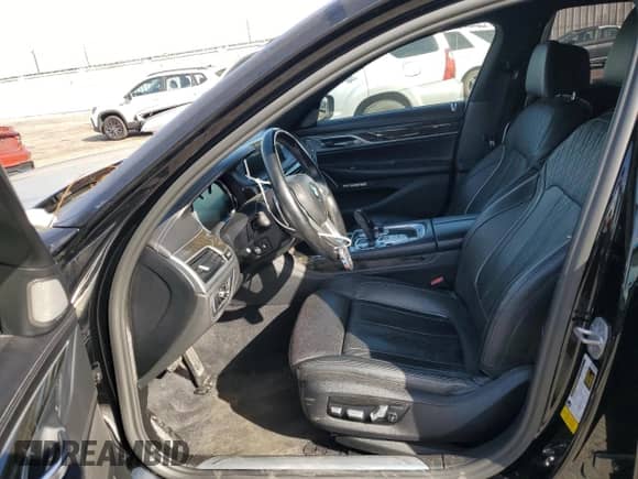 2018 BMW 7 Series 750i с VIN WBA7F0C54JGM23724, выставлен на аукционе Copart как лот 89399285 с пробегом 141 167 миль миль и Списание • Salvage title. История ставок и продаж доступна на DreamBid. Изображение 7.
