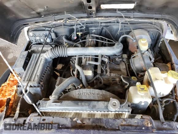 1997 Jeep Wrangler Sport z VIN 1J4FY19S8VP446600, wystawiony jako Copart lot #86882375 z przebiegiem 70 322 mil mil oraz Czysty tytuł • Clean title. Historia ofert i sprzedaży dostępna na DreamBid. Obrazek 11.