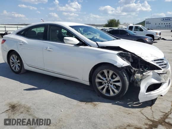 2013 Hyundai Azera с VIN KMHFG4JGXDA325761, выставлен на аукционе Copart как лот 70225975 с пробегом 126 944 миль миль и Списание • Salvage title. История ставок и продаж доступна на DreamBid. Изображение 4.