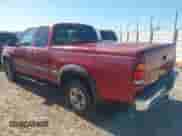 2002 Toyota Tundra SR5 with VIN 5TBRT34142S278086, listed as a IAAI auction lot 43433691 with 209,357 mi miles and . Bid and sale history available at DreamBid. Image 3.