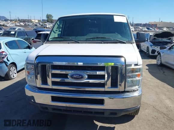 2012 Ford Econoline Cargo Recreational with VIN 1FTNE2EW2CDA52064, listed as a IAAI auction lot 43027070 with 128,381 mi miles and . Bid and sale history available at DreamBid. Image 12.