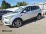 2017 Ford Escape SE с VIN 1FMCU9GD3HUC41579, выставлен на аукционе Copart как лот 84071535 с пробегом 142 241 миль миль и Чистый • Clean title. История ставок и продаж доступна на DreamBid. Изображение 1.
