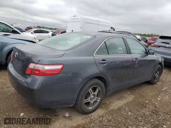 2007 Toyota Camry CE with VIN 4T1BE46K97U505673, listed as a Copart auction lot 84802525 with 153,986 mi miles and Clean title. Bid and sale history available at DreamBid. Image 3.