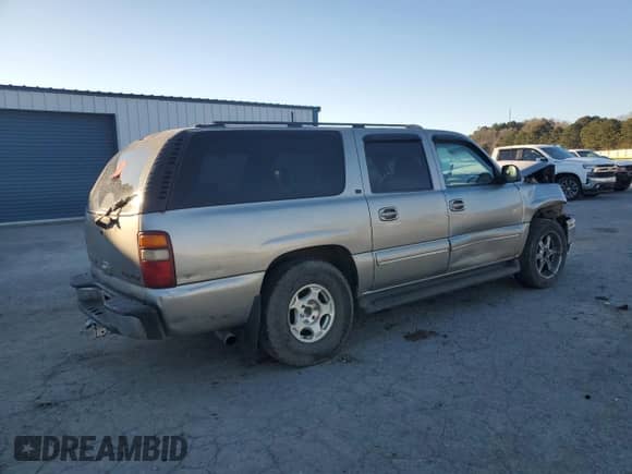 2001 Chevrolet Suburban LS z VIN 3GNFK16T11G215211, wystawiony jako Copart lot #55497355 z przebiegiem 277 816 mil mil oraz Szkoda całkowita • Salvage title. Historia ofert i sprzedaży dostępna na DreamBid. Obrazek 3.