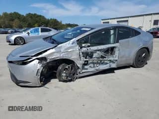 2024 Toyota Prius LE with VIN JTDACAAU5R3045630, listed as a Copart auction lot 82104245 with 19,886 mi miles and Salvage title. Bid and sale history available at DreamBid. Image 1.