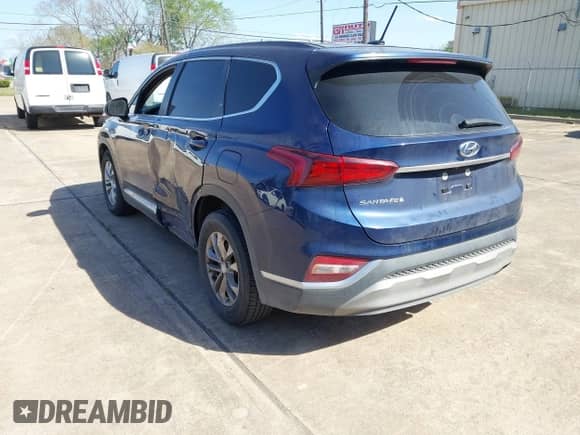 2020 Hyundai Santa Fe SE with VIN 5NMS23AD0LH141404, listed as a IAAI auction lot 41870350 with 144,109 mi miles and . Bid and sale history available at DreamBid. Image 3.