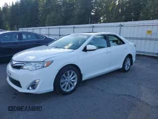 2013 Toyota Camry XLE with VIN 4T1BK1FK7DU021651, listed as a Copart auction lot 82239685 with 71,993 mi miles and Salvage title. Bid and sale history available at DreamBid. Image 1.