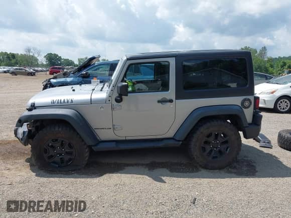 2015 Jeep Wrangler Sport with VIN 1C4AJWAG2FL507778, listed as a IAAI auction lot 42665428 with 126,554 mi miles and . Bid and sale history available at DreamBid. Image 15.