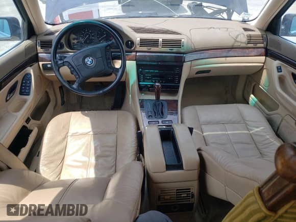 1997 BMW 7 Series 740iL with VIN WBAGJ8324VDM02317, listed as a Copart auction lot 64879564 with 107,365 mi miles and Salvage title. Bid and sale history available at DreamBid. Image 8.