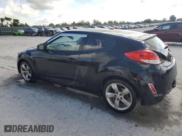 2015 Hyundai Veloster z VIN KMHTC6AD0FU237545, wystawiony jako Copart lot #69858765 z przebiegiem 182 058 mil mil oraz Szkoda całkowita • Salvage title. Historia ofert i sprzedaży dostępna na DreamBid. Obrazek 2.