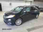 2014 Toyota Sienna XLE with VIN 5TDYK3DC8ES464113, listed as a Copart auction lot 82118295 with 142,513 mi miles and Salvage title. Bid and sale history available at DreamBid. Image 1.