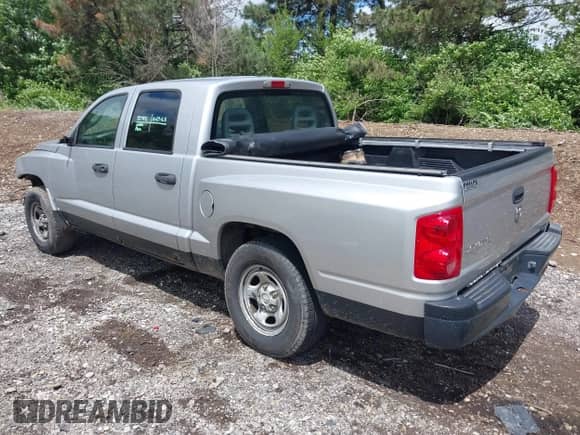 2006 Dodge Dakota ST with VIN 1D7HW28K36S626910, listed as a IAAI auction lot 42193257 with 158,933 mi miles and . Bid and sale history available at DreamBid. Image 3.