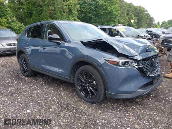 2022 Mazda CX-5 S Preferred z VIN JM3KFBCM3N0643362, wystawiony jako IAAI lot #42644466 z przebiegiem 16 227 mil mil oraz . Historia ofert i sprzedaży dostępna na DreamBid. Obrazek 13.