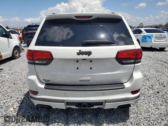 2018 Jeep Grand Cherokee High Altitude с VIN 1C4RJECG1JC125437, выставлен на аукционе Copart как лот 61579045 с пробегом 90 993 миль миль и Списание • Salvage title. История ставок и продаж доступна на DreamBid. Изображение 6.