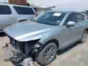 2022 Mazda CX-5 S Select z VIN JM3KFBBMXN0638208, wystawiony jako IAAI lot #43058565 z przebiegiem 34 039 mil mil oraz . Historia ofert i sprzedaży dostępna na DreamBid. Obrazek 2.