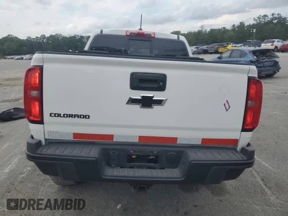 2020 Chevrolet Colorado 4WD ZR2 with VIN 1GCPTEE13L1154592, listed as a Copart auction lot 53695085 with 35,907 mi miles and Salvage title. Bid and sale history available at DreamBid. Image 6.