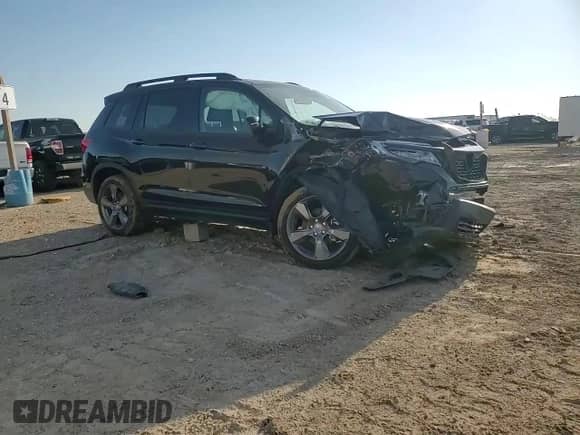 2021 Honda Passport Touring с VIN 5FNYF7H90MB010998, выставлен на аукционе Copart как лот 68742275 с пробегом Не указан миль и Списание • Salvage title. История ставок и продаж доступна на DreamBid. Изображение 14.