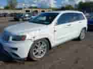 2014 Jeep Grand Cherokee Summit with VIN 1C4RJFJM3EC373015, listed as a IAAI auction lot 43321112 with 85,655 mi miles and . Bid and sale history available at DreamBid. Image 2.