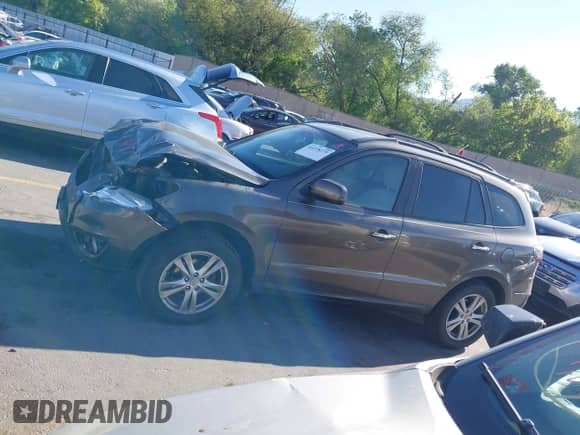 2012 Hyundai Santa Fe Limited with VIN 5XYZK4AG1CG136687, listed as a IAAI auction lot 42278275 with 138,764 mi miles and . Bid and sale history available at DreamBid. Image 14.