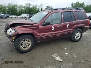 2000 Jeep Grand Cherokee Limited с VIN 1J4G258N2YC285553, выставлен на аукционе Copart как лот 57183125 с пробегом 128 085 миль миль и Списание • Salvage title. История ставок и продаж доступна на DreamBid. Изображение 1.