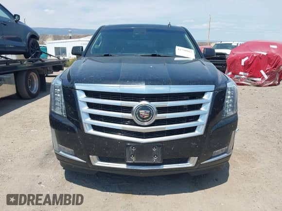 2015 Cadillac Escalade ESV Premium z VIN 1GYS4JKJ1FR290370, wystawiony jako IAAI lot #42798963 z przebiegiem 179 935 mil mil oraz . Historia ofert i sprzedaży dostępna na DreamBid. Obrazek 12.