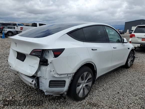 2023 Tesla Model Y Long Range с VIN 7SAYGAEE9PF584339, выставлен на аукционе Copart как лот 56988655 с пробегом Не указан миль и Списание • Salvage title. История ставок и продаж доступна на DreamBid. Изображение 3.