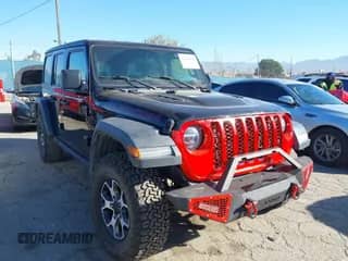 2021 Jeep Wrangler Unlimited Rubicon with VIN 1C4HJXFG1MW649077, listed as a IAAI auction lot 43496520 with 52,136 mi miles and . Bid and sale history available at DreamBid. Image 1.