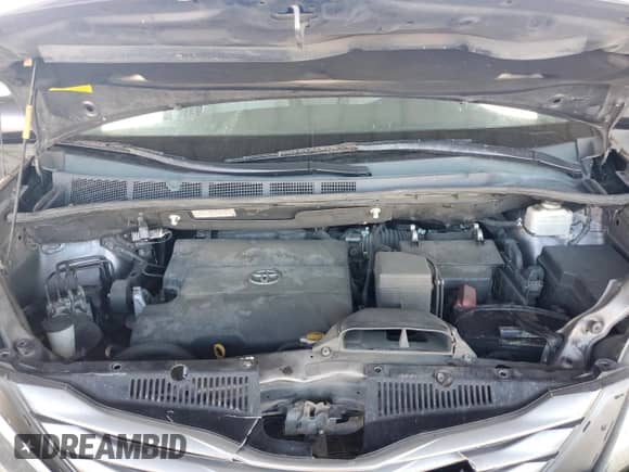 2012 Toyota Sienna XLE AAS with VIN 5TDYK3DC8CS254348, listed as a Copart auction lot 81454545 with 194,295 mi miles and Salvage title. Bid and sale history available at DreamBid. Image 12.