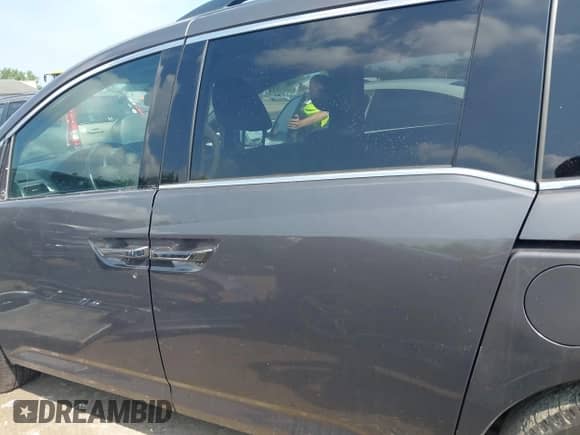 2016 Honda Odyssey Touring Elite z VIN 5FNRL5H97GB034558, wystawiony jako IAAI lot #42862918 z przebiegiem 118 891 mil mil oraz . Historia ofert i sprzedaży dostępna na DreamBid. Obrazek 15.