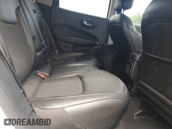 2020 Jeep Compass Trailhawk z VIN 3C4NJDDB6LT184728, wystawiony jako Copart lot #65729635 z przebiegiem Nie podano mil oraz Szkoda całkowita • Salvage title. Historia ofert i sprzedaży dostępna na DreamBid. Obrazek 11.