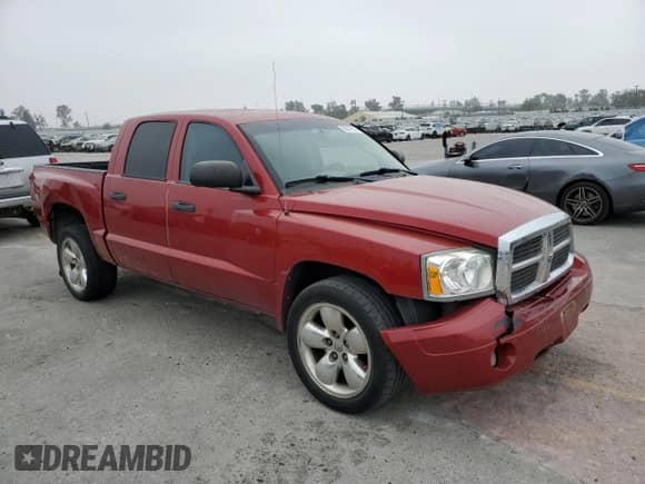 2007 Dodge Dakota SLT с VIN 1D7HE48K97S215043, выставлен на аукционе Copart как лот 59347535 с пробегом 211 768 миль миль и Списание • Salvage title. История ставок и продаж доступна на DreamBid. Изображение 4.