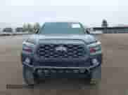 2021 Toyota Tacoma SR with VIN 3TMCZ5AN3MM450562, listed as a IAAI auction lot 43071461 with 15,850 mi miles and . Bid and sale history available at DreamBid. Image 12.