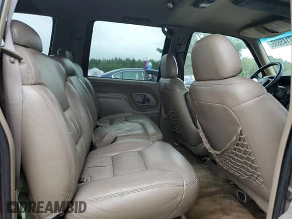 1999 Chevrolet Suburban с VIN 3GNEC16R9XG186868, выставлен на аукционе Copart как лот 67145805 с пробегом 296 144 миль миль и Списание • Salvage title. История ставок и продаж доступна на DreamBid. Изображение 11.