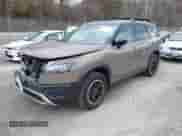 2023 Nissan Pathfinder Rock Creek with VIN 5N1DR3BD9PC254223, listed as a IAAI auction lot 41738783 with 21,231 mi miles and . Bid and sale history available at DreamBid. Image 2.