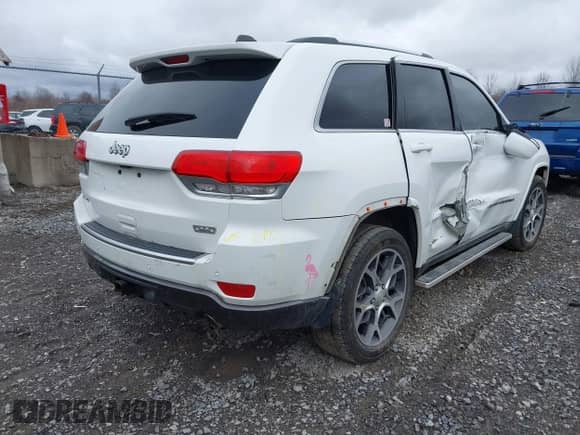2018 Jeep Grand Cherokee Sterling with VIN 1C4RJFBG7JC263183, listed as a IAAI auction lot 41801205 with 104,301 mi miles and . Bid and sale history available at DreamBid. Image 4.