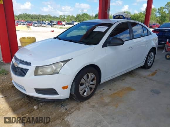 2013 Chevrolet Cruze LS with VIN 1G1PB5SH8D7124340, listed as a IAAI auction lot 42569910 with 249,425 mi miles and . Bid and sale history available at DreamBid. Image 2.