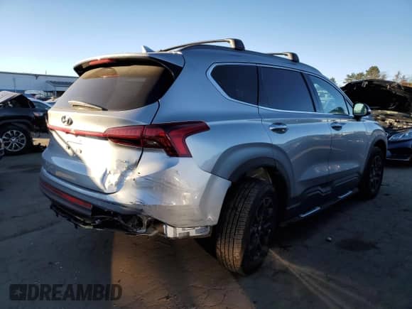 2022 Hyundai Santa Fe XRT с VIN 5NMS6DAJ0NH414005, выставлен на аукционе Copart как лот 66886692 с пробегом 4 585 миль миль и . История ставок и продаж доступна на DreamBid. Изображение 4.