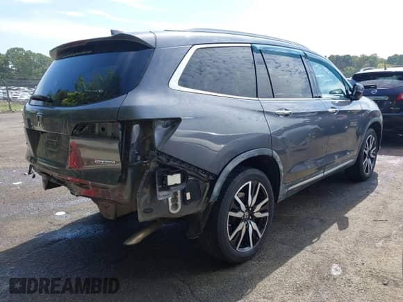 2019 Honda Pilot Touring 8-Passenger z VIN 5FNYF5H95KB010979, wystawiony jako IAAI lot #43285702 z przebiegiem 147 812 mil mil oraz . Historia ofert i sprzedaży dostępna na DreamBid. Obrazek 4.