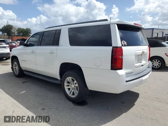 2018 Chevrolet Suburban LT z VIN 1GNSCHKC8JR265680, wystawiony jako Copart lot #82226635 z przebiegiem 155 575 mil mil oraz Czysty tytuł • Clean title. Historia ofert i sprzedaży dostępna na DreamBid. Obrazek 2.