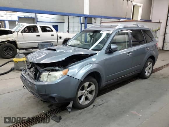 2013 Subaru Forester XT Touring z VIN JF2SHGGCXDH431769, wystawiony jako Copart lot #83704724 z przebiegiem 147 003 mil mil oraz Szkoda całkowita • Salvage title. Historia ofert i sprzedaży dostępna na DreamBid. Obrazek 1.