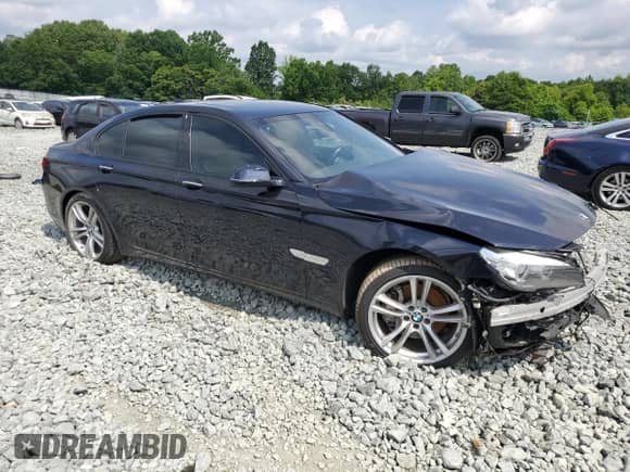 2014 BMW 7 Series 740i с VIN WBAYA6C57ED826660, выставлен на аукционе Copart как лот 59566945 с пробегом 95 828 миль миль и Списание • Salvage title. История ставок и продаж доступна на DreamBid. Изображение 4.