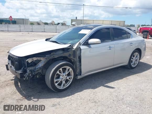 2014 Nissan Maxima SV z VIN 1N4AA5AP1EC494763, wystawiony jako IAAI lot #42931030 z przebiegiem 169 540 mil mil oraz . Historia ofert i sprzedaży dostępna na DreamBid. Obrazek 2.