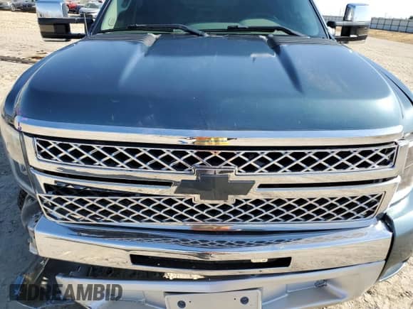 2012 Chevrolet Silverado 1500 LS z VIN 3GCPCREA1CG224955, wystawiony jako Copart lot #68713195 z przebiegiem 105 680 mil mil oraz Szkoda całkowita • Salvage title. Historia ofert i sprzedaży dostępna na DreamBid. Obrazek 11.