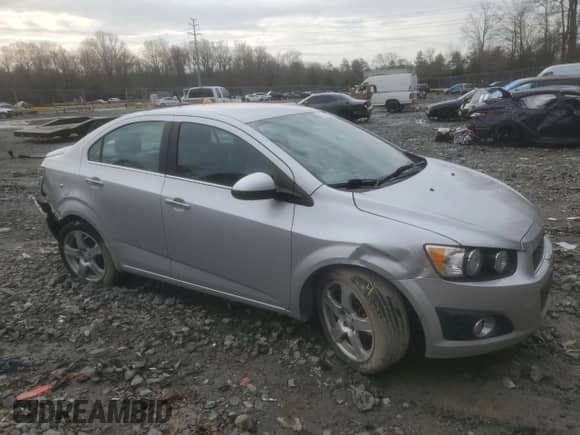 2014 Chevrolet Sonic LTZ with VIN 1G1JE5SB4E4201684, listed as a Copart auction lot 43089345 with 161,948 mi miles and Salvage title. Bid and sale history available at DreamBid. Image 4.