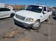 2000 Ford F-150 XL with VIN 1FTRF18W2YNB42014, listed as a IAAI auction lot 41827247 with Not provided miles and . Bid and sale history available at DreamBid. Image 2.