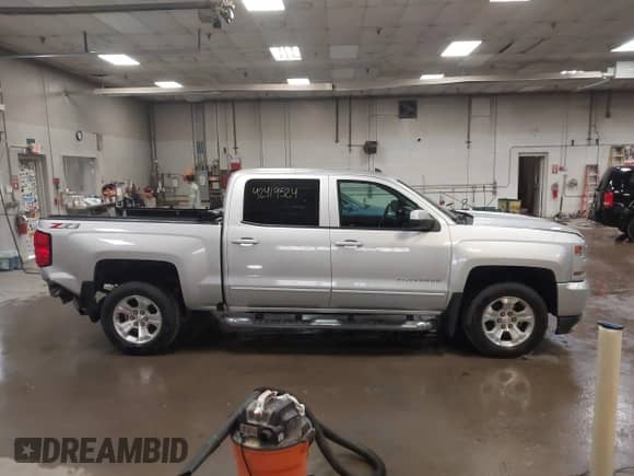 2018 Chevrolet Silverado 1500 LT с VIN 3GCUKRECXJG492648, выставлен на аукционе IAAI как лот 42419524 с пробегом 124 277 миль миль и . История ставок и продаж доступна на DreamBid. Изображение 14.