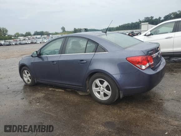 2013 Chevrolet Cruze 1LT z VIN 1G1PC5SBXD7284812, wystawiony jako Copart lot #70773015 z przebiegiem 58 165 mil mil oraz Czysty tytuł • Clean title. Historia ofert i sprzedaży dostępna na DreamBid. Obrazek 2.