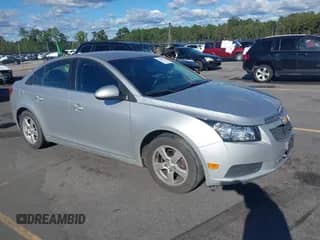2014 Chevrolet Cruze 1LT with VIN 1G1PC5SB6E7387534, listed as a IAAI auction lot 43433757 with 132,459 mi miles and . Bid and sale history available at DreamBid. Image 1.